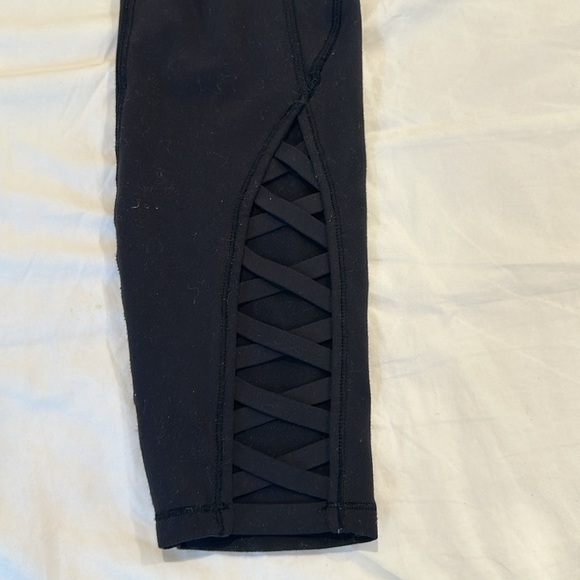Black Lululemon Athletica High Rise Criss Cross Ankle Leggings - Picture 7 of 8